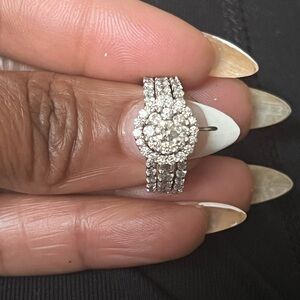She is a halo diamond set and is 3  1/2 carats. Straight buy